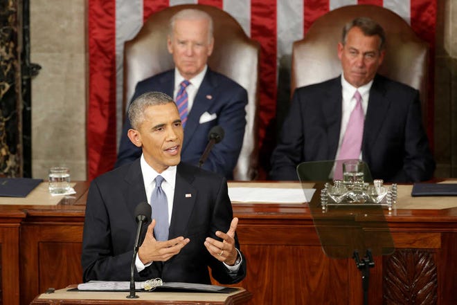 FILE - In this Jan. 20, 2015, file photo, President Barack Obama gives his State of the Union address before a joint session of Congress on Capitol Hill in Washington as Vice Presient Joe Biden and House Speaker John Boehner listen. (AP Photo/J. Scott Applewhite, File)
