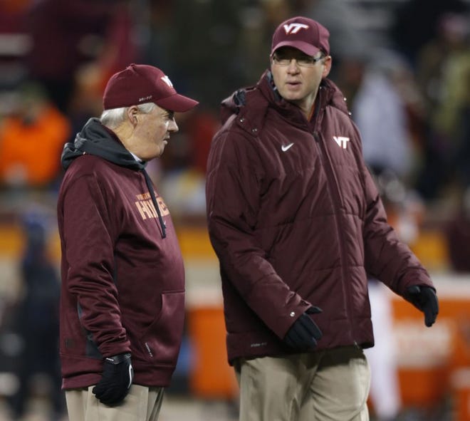 Scot Loeffler (right), who was the offensive coordinator at Virginia Tech under Frank Beamer (left) the last three years, was named Boston College's new offensive coordinator on Tuesday.