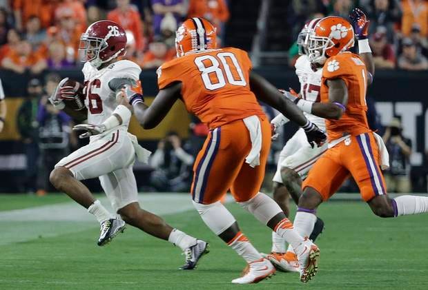 Alabama's Marlon Humphrey runs with the ball after catching an onside kick that changed the national championship game. (AP Photo)
