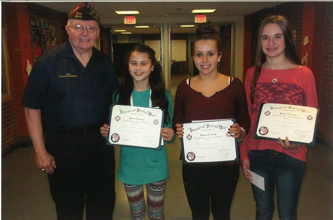 Pictured from left to right are Veterans of Foreign Wars Post 2346 Past State Commander Stanley T. King, Patriot’s Pen essay contest first place winner Gianna Petkewich, second place winner Shaylin Groark and third place winner Rebecca Prezioso. Courtesy photo
