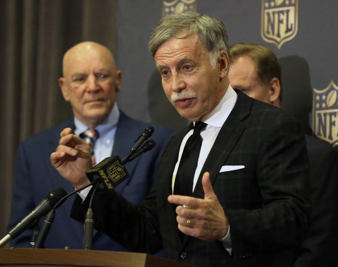 Rams Owner Stan Kroenke talks to the media in Houston after NFL owners voted to allow the Rams to move to a new stadium outside Los Angeles, shown in an artist’s rendering at top right, and the San Diego Chargers will have an option to share the faciiity.