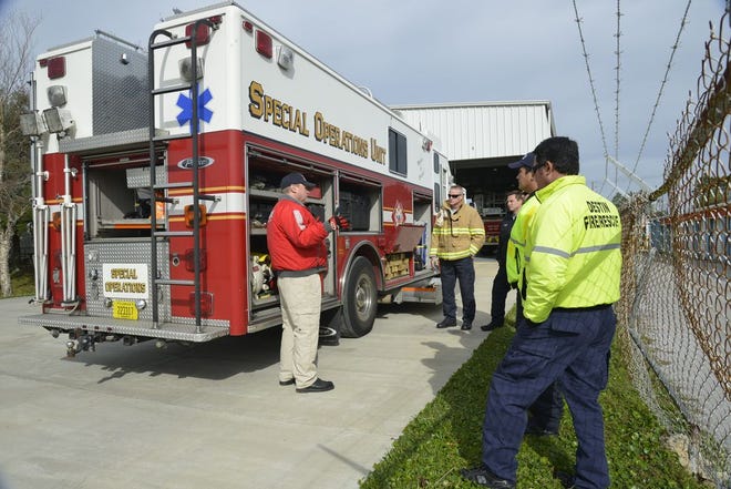 Seven members of the Destin Fire Control District train with Okaloosa County Hazmat team Capt. Mike Taylor.