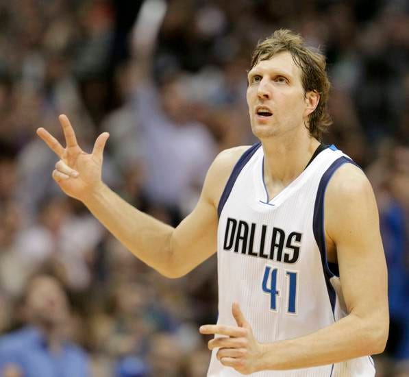 Dallas Mavericks forward Dirk Nowitzki (41) celebrates after making a 3-pointer against the Oklahoma City Thunder during the second half of an NBA basketball game Monday, March 16, 2015, in Dallas. The Mavericks won 119-115. (AP Photo/The Dallas Morning News, Vernon Bryant)