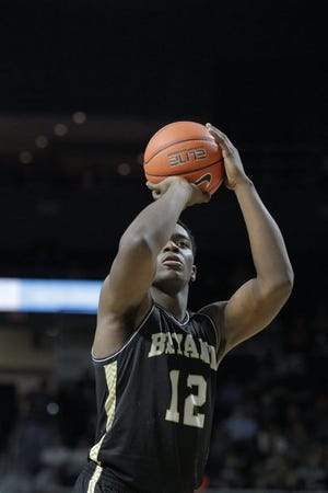 Freshman Marcel Pettway of Bryant hoists up a shot against Providence College last month.