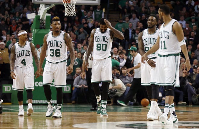 Celtics guard Marcus Smart (36) is trying to find his shot. The Associated Press