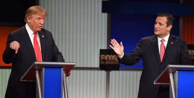 Republican presidential candidate Donald Trump, left, and Texas Sen. Ted Cruz, during one of their exchanges at Thursday night's GOP presidential debate at the North Charleston Coliseum. AP Photo/Rainier Ehrhardt