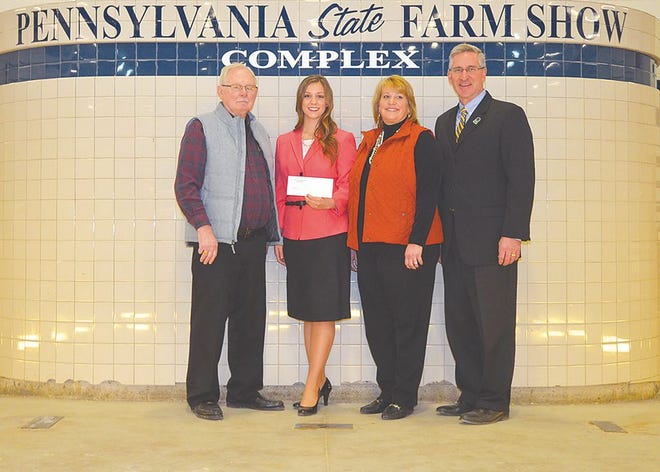 Congratulations to 2016 Farm Show Scholarship recipient, Claudia Hissong of Greencastle. Scholarships were awarded Tuesday, Jan. 12, at the 100th Pennsylvania Farm Show. Pictured are Bill Campbell, Claudia Hissong, Regina Hissong, Agriculture Secretary Russell Redding.