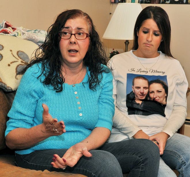 Joan Paquette Pearce talks about her late daughter, Melanie, with another daughter, Holly Majewski, seen at right.