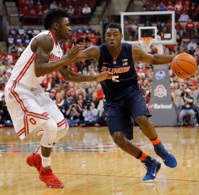 Illinois freshman Jalen Coleman-Lands, right, drives to the basket against Ohio State's Kam Williams during the first half of an NCAA college basketball game Sunday, Jan. 3, 2016, in Columbus, Ohio.