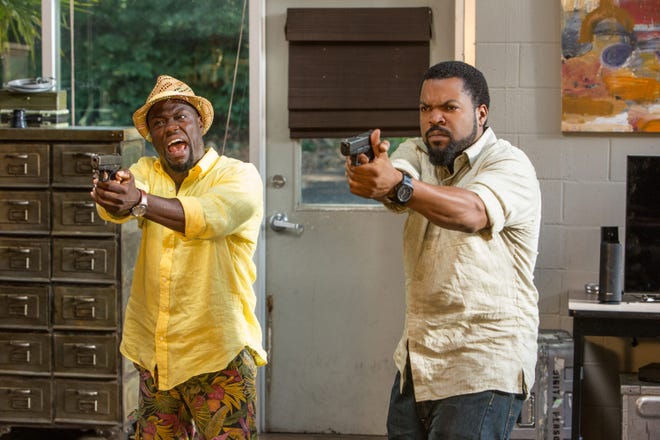Kevin Hart, left, as Ben Barber and Ice Cube as James Payton in "Ride Along 2." (Universal Pictures)