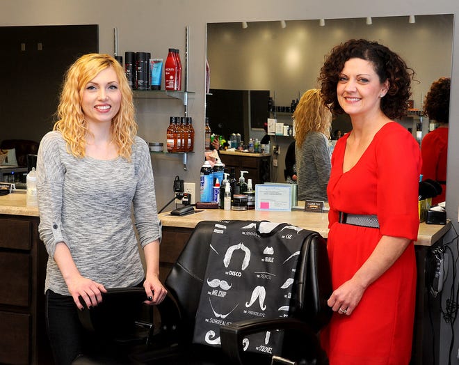 Stephanie Murray, left, and D.J. Bishop have opened Clean Cut Barbershop at 510 E. Green Meadows Road, Suite 105.