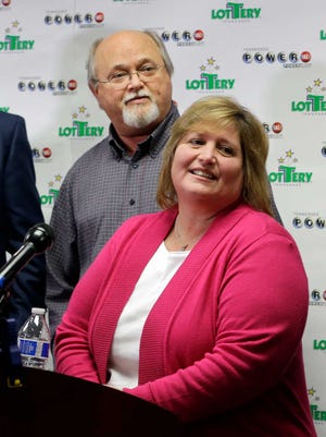 John and Lisa Robinson attend a news conference Friday, Jan. 15, 2016, in Nashville, Tenn. The Robinsons' winning Powerball ticket is one of three winning tickets in the $1.6 billion jackpot drawing held Wednesday. (AP Photo/Mark Humphrey)