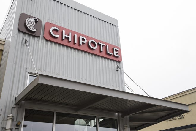 Chipotle Mexican Grill will close all of its U.S. stores for part of the day Feb. 8 while its employees attend a national team meeting, a company spokesman said Friday. (AP Photo/Stephen Brashear, File)