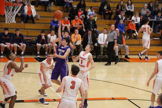 Chase Shawgo (5) got nothing but net on this runner in the lane in Canton’s game against Mahomet-Seymour in the Washington Team Works Tournament on Saturday. The Bulldogs went on to win 65-28. Later, in the day, the Little Giants lost 79-39 to Grayslake North.