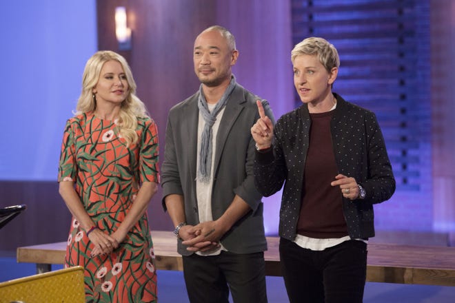 This image released by HGTV shows judges Christiane Lemieux, from left, and Cliff Fong with Ellen DeGeneres during the taping of "Ellen's Design Challenge," returning for a second season on HGTV. Gilles Mingasson/HGTV via AP