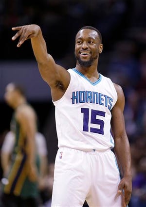 Kemba Walker enjoying a moment during Monday's Charlotte Hornets' franchise-record 52-point performance in home win over Utah.