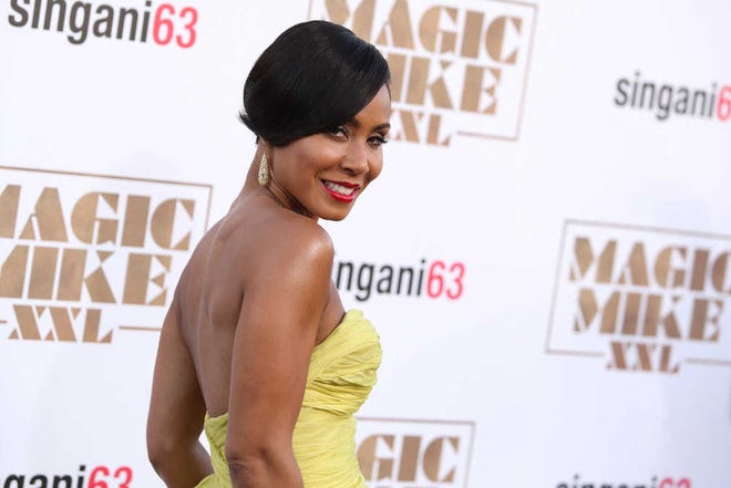 In a Thursday, June 25, 2015 file photo, Jada Pinkett-Smith arrives at the Los Angeles premiere of "Magic Mike XXL" at the TCL Chinese Theatre. Calls for a boycott of the Academy Awards are growing over the Oscars' second straight year of mostly white nominees, as Spike Lee and Jada Pinkett Smith each said Monday, Jan. 17, 2016, that they will not attend this year's ceremony. (Photo by Paul A. Hebert/Invision/AP, File)