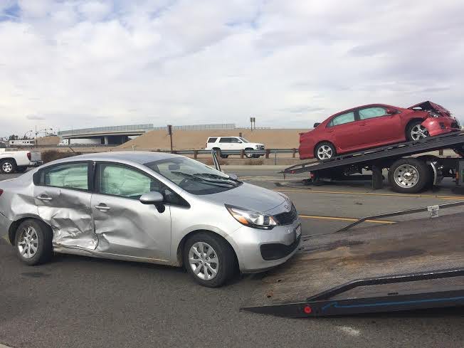 A two-vehicle collision on Mariposa Road involving Daily Press photographer Jose Huerta occurred Tuesday morning in Hesperia. Staff photos by Monica Solano