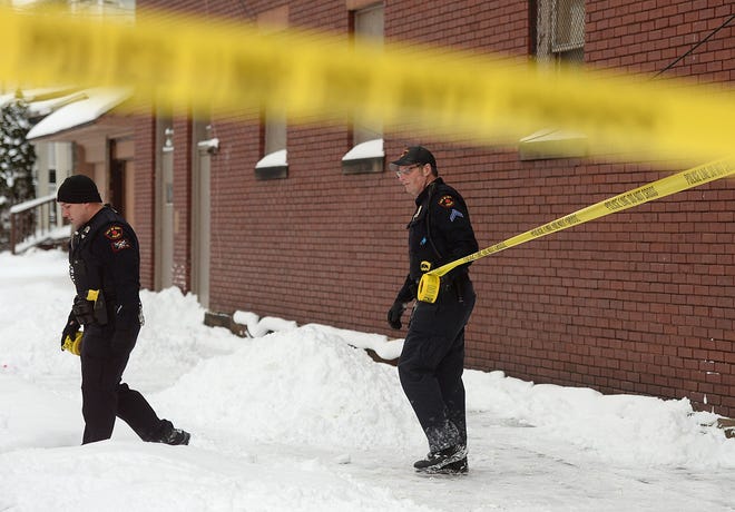 Erie police investigate a reported shooting at Parade and East 27th streets on Jan. 19. A male with a gunshot wound to the leg was transported to UPMC Hamot. JACK HANRAHAN/