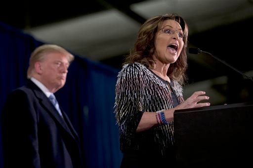 Former Alaska Gov. Sarah Palin, right, endorses Republican presidential candidate Donald Trump during a rally at the Iowa State University, Tuesday, Jan. 19, 2016, in Ames, Iowa.