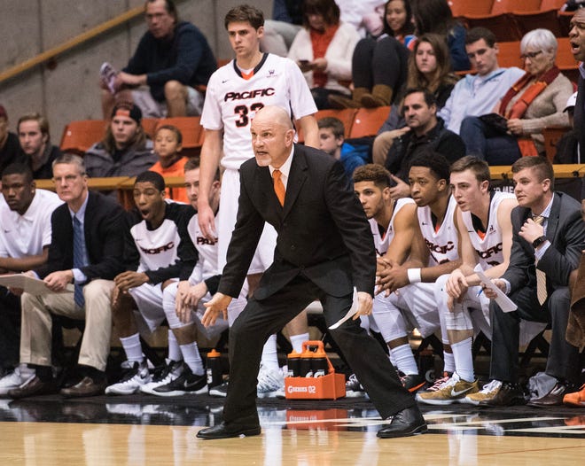 Pacific interim men's basketball coach Mike Burns encourages his team during a West Coast Conference game against Santa Clara on Dec. 21 at Spanos Center. Burns took over for head coach Ron Verlin last month in wake of an NCAA investigation. RECORD FILE 2015