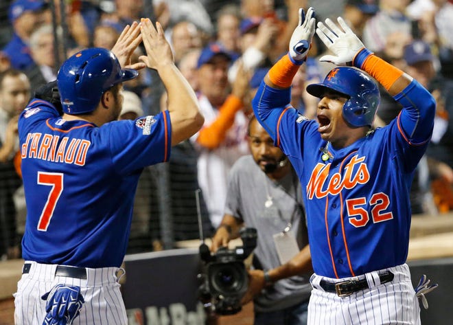 Yoenis Cespedes (52), who helped the Mets reach the World Series last year, is drawing a great deal of interest in the free-agent market. The Associated Press