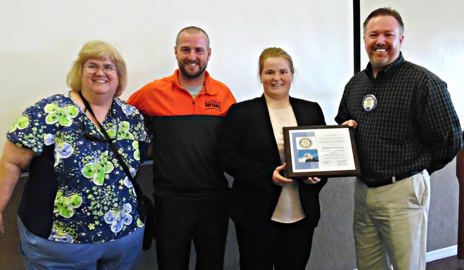 The Rotary Club of Port Orange-South Daytona recently presented the January 2016 Scholar/Athlete Award to Spruce Creek senior Emma Ferguson. She has a 4.5588 GPA and is the daughter of Linda and John Ferguson of Port Orange. She plays first base on the softball team and is a member of both the National Honor Society and Spanish Honor Society. Emma also is involved in community service activities including summer camp volunteer counselor at the Marine Discovery Center, Special Olympics and webmaster of the club softball website. She plans to major in chemical engineering in college. Pictured are, from left, Linda Ferguson, Coach Cameron McClelland, Emma Ferguson and Shawn Goepfert.