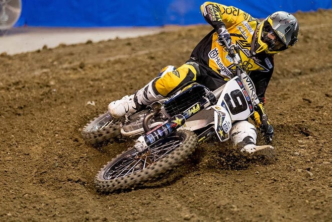 Arenacross is an up-and-coming sport that takes motocross and tosses it into an arena full of dirt.
