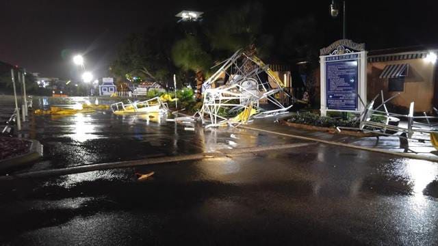 This photo from the Okaloosa County Sheriff's Office shows some debris that blew into a parking lot at HarborWalk Village.