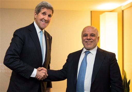 U.S. Secretary of State John Kerry shakes hands with Iraqi Prime Minister Haider al-Abadi at the 2016 World Economic Forum in Davos, Switzerland, on Thursday, Jan. 21, 2016. Kerry"™s trip is expected to last nine days and to encompass stops in Switzerland, Saudi Arabia, Laos, Cambodia, and China. (AP Photo/Jacquelyn Martin, Pool)