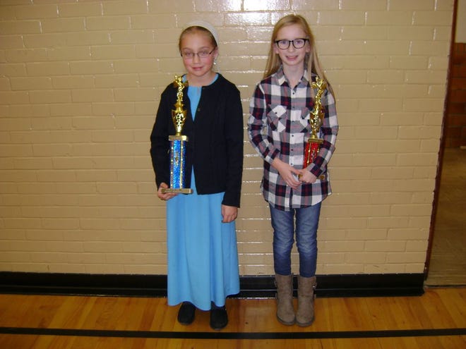 Baltic Elementary Spelling Bee winner Cheryl Erb, left, and runner-up Hannah Steiner.