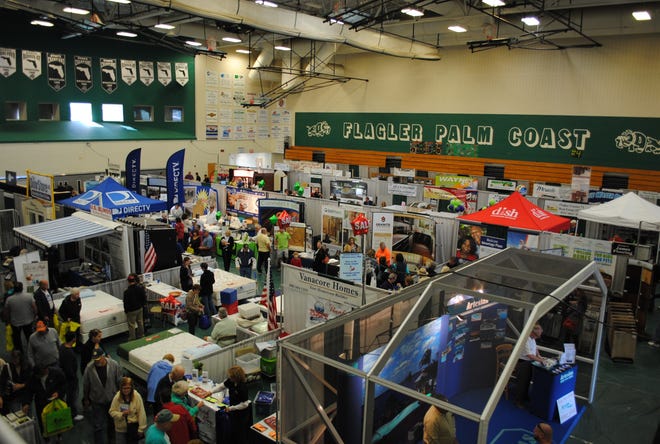 Booths fill the gym at Flagler Palm Coast High School during the 2015 Flagler Home & Lifestyle Show. The event celebrates its 30th anniversary Jan. 23 and 24 with vendor booths, entertainment, food and fun. NEWS-TRIBUNE FILE