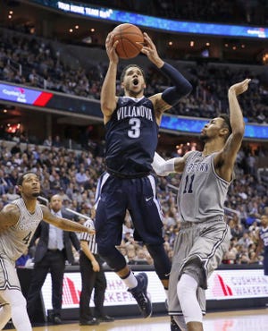 Villanova guard Josh Hart, shooting against Isaac Copeland of Georgetown on Jan. 16, will be a matchup problem for PC on Sunday.