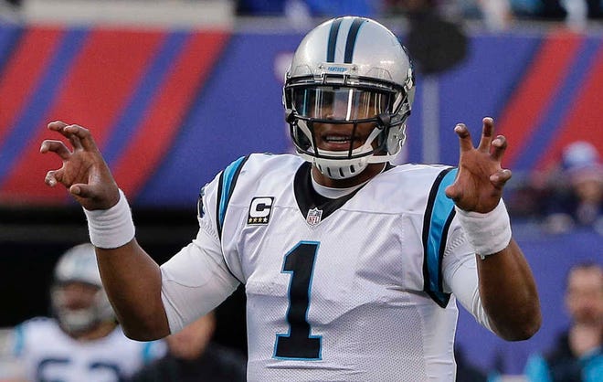 FILE - In this Dec. 20, 2015, file photo, Carolina Panthers quarterback Cam Newton calls an audible at the line of scrimmage during the second half of an NFL football game against the New York Giants, in East Rutherford, N.J. Arizona and Carolina play in the NFC Championship game on Sunday, Jan. 24, in Charlotte, N.C. (AP Photo/Julie Jacobson, File)