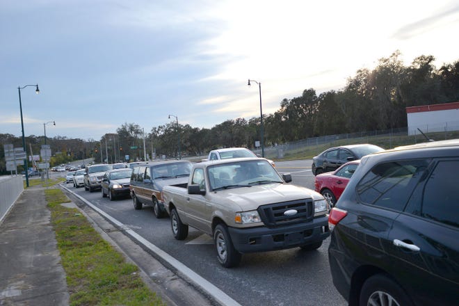 Traffic is backed up during rush hour at the intersection of U.S. Highway 441 and County Road 44 in Leesburg on Thursday.