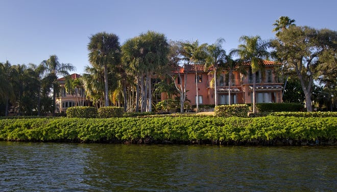Anonymous business entities often purchase mansions like this one in Miami so the true owner remains unidentified, but the U.S. government will soon require that the "beneficial owner" be named in such all-cash transitions. Miami Herald files/Patrick Farrell
