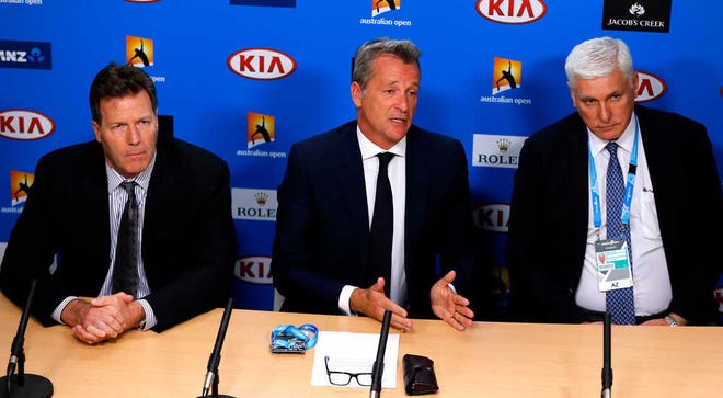 ATP chairman Chris Kermode, center, speaks during a press conference at the Australian Open tennis championships in Melbourne, Australia, Monday, Jan. 18, 2016. Chairman Kermode and the Tennis Integrity United have rejected news reports that match-fixing has gone unchecked in the sport. In reports published on the morning the Australian Open began, the BBC and BuzzFeed News said secret files exposed evidence of widespread suspected match-fixing at the top level of world tennis. At right is Nigel Willerton, head of the Tennis Integrity Unit. At left is ATP Vice Chairman Mark Young. (AP Photo/Shuji Kajiyama)