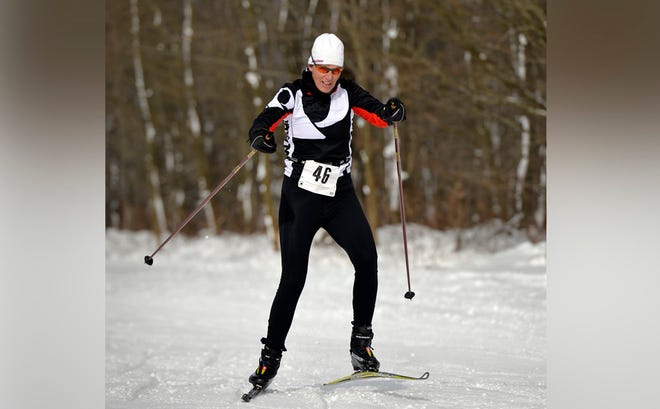 Nancy Herbst nears the finish line of the 2015-16 Highmark Quad Games ski race to take first place in the women's division during the event at Wilderness Lodge on Jan. 24 in Venango Township. ANDY COLWELL/