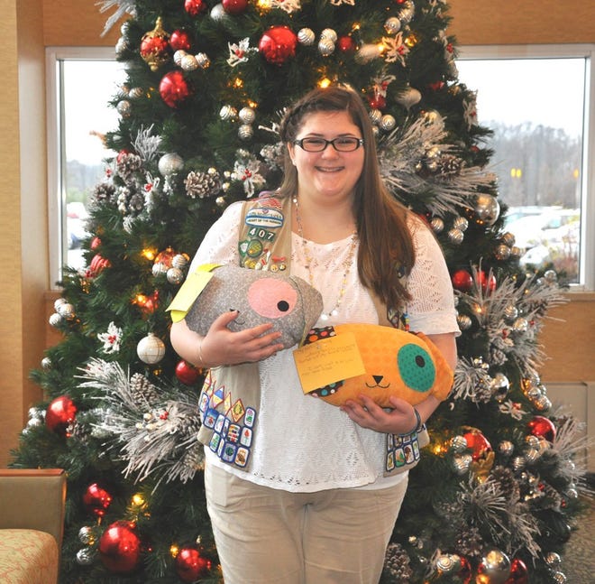 Rebecca Garloch visited Orange Regional on her birthday to donate handmade "puppy pillows" to patients. PHOTO PROVIDED