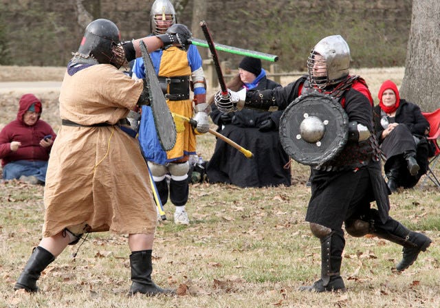 Jamie Mitchell • Times Record Matt Tabarez, left, and Russ Tabarez and Adam Edward wield their weapons of war, Sunday, Jan 24, 2016, during combat at the Society for Creative Anacronism gathering in Creekmore Park. According to SCA.org, the Society for Creative Anachronism is an international organization dedicated to researching and re-creating the arts and skills of pre-17th-century Europe. The SCA's “Known World” consists of 20 kingdoms, with over 30,000 members residing in countries around the world. Members, dressed in clothing of the Middle Ages and Renaissance, attend events which feature tournaments, royal courts, feasts, dancing, various classes & workshops, and more. SCA will host their monthly meeting Jan 26, 2016, at Sweet Bay Coffee, 3400 Rogers Avenue at 6:30 p.m. 
 Jamie Mitchell • Times Record Gene Hester, left, and Adam Edwards wield their weapons of war, Sunday, Jan 24, 2016, during combat at the Society for Creative Anacronism gathering in Creekmore Park. According to SCA.org, the Society for Creative Anachronism is an international organization dedicated to researching and re-creating the arts and skills of pre-17th-century Europe. The SCA's “Known World” consists of 20 kingdoms, with over 30,000 members residing in countries around the world. Members, dressed in clothing of the Middle Ages and Renaissance, attend events which feature tournaments, royal courts, feasts, dancing, various classes & workshops, and more. SCA will host their monthly meeting Jan 26, 2016, at Sweet Bay Coffee, 3400 Rogers Avenue at 6:30 p.m. 
 Jamie Mitchell • Times Record Adam Edwards, left, and Russ Thurston wield their weapons of war, Sunday, Jan 24, 2016, during combat at the Society for Creative Anacronism gathering in Creekmore Park. According to SCA.org, the Society for Creative Anachronism is an international organization dedicated to researching and re-creating the arts and skills of pre-17th-century Europe. The SCA's “Known World” consists of 20 kingdoms, with over 30,000 members residing in countries around the world. Members, dressed in clothing of the Middle Ages and Renaissance, attend events which feature tournaments, royal courts, feasts, dancing, various classes & workshops, and more. SCA will host their monthly meeting Jan 26, 2016, at Sweet Bay Coffee, 3400 Rogers Avenue at 6:30 p.m.