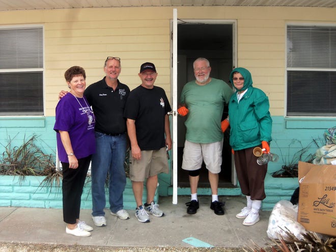 Ormond-by-the-Sea Lions Club members, from left, Vice President Bobbie Cheh, Greg Evans, Director John Thomas, President Les Walter and Zone Chair Mary Yochum, met at a local hotel being demolished. Members selected items that the homeless could use out of the hotel and three pick-up truck loads were put in storage. The Halifax Habitat for Humanity Restore also had a panel truck full of donations before demolition began.
