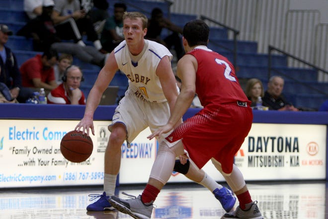 Embry-Riddle guard Reed Ridder, left, dribbles during a game with Florida Southern on Jan. 6. ERAU will host the Sunshine State Conference basketball championships in March. Florida Southern has won the men's tournament each of the last four seasons.
News-Journal/LOLA GOMEZ