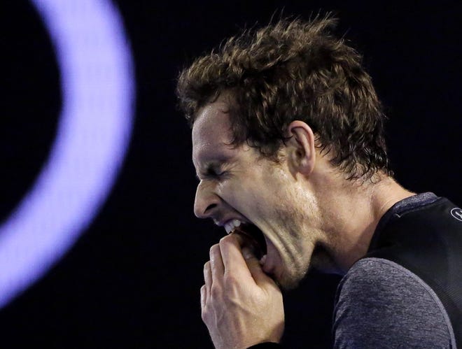 Andy Murray of Britain reacts during his fourth round match against Bernard Tomic of Australia at the Australian Open tennis championships in Melbourne, Australia, Monday, Jan. 25, 2016.(AP Photo/Aaron Favila)