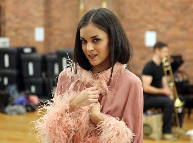 This Jan. 8, 2016 photo shows Andrea Goss, who plays chanteuse Sally Bowles, a role made famous by Liza Minnelli and Natasha Richardson, during a rehearsal in New York for the "Cabaret" tour. The musical, about the world of the indulgent Kit Kat Klub in Berlin, kicks off in Rhode Island on Tuesday, Jan. 26, 2016. (AP Photo/Mark Kennedy)
