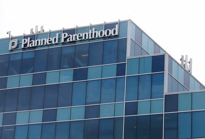 This Oct. 22, 2015, photo shows a Planned Parenthood in Houston. A grand jury investigating undercover footage of Planned Parenthood found no wrongdoing Monday, Jan. 25, 2016, by the abortion provider, and instead indicted anti-abortion activists involved in making the videos that targeted the handling of fetal tissue in clinics and provoked outrage among Republican leaders nationwide. The footage from the clinic in Houston. (Melissa Phillip/Houston Chronicle via AP)