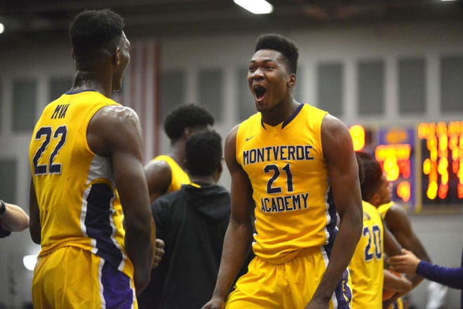 Montverde Academy's Bruno Fernando (21) and Silvio de Sousa (22) celebrate after the Eagles beat Huntington Prep on Dec. 7 in the school's Center for Sportsmanship and Wellness in Montverde. The Eagles host the 13th annual Montverde Academy Invitational Tournament, which begins Thursday.