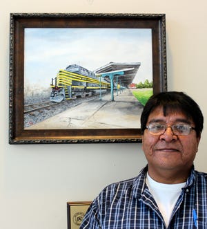 Kyle Gentry is the January 2016 Featured Artist of the Deltona Art Club. His acrylic painting of a train station, titled Nickel Plate, is displayed in the lobby of Deltona City Hall. The painting was created as part of a Deltona Art Club "challenge" to produce an art work that demonstrated the concept of perspective, one of the most difficult concepts for artists to master. The train detail comes from an historical model of Nickel Plate Road Railroad, the name for the New York, Chicago and St. Louis Railroad which began operation in 1881. 
The Deltona Art Club meets 9:30 a.m. the second Wednesday of each month, September through May, at the Deltona Regional Library. The club also meets year round for workshop time 12:30-3 p.m. each Thursday at the Deltona Senior Center on Lakeshore Drive.