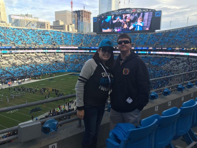 Allison Drennan and Gabe Whisnant pose for a picture together before the Carolina Panthers game versus the Tampa Bay Buccaneers at Bank of America Stadium on Jan. 3.