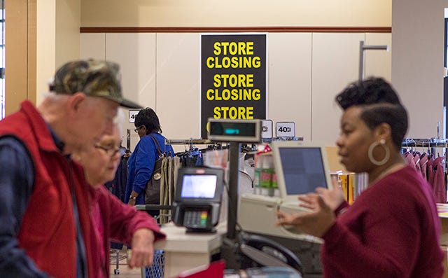 A Goody’s associate rings up customers on Tuesday afternoon. Goody’s has announced it will be closing its doors, for the second time, on March 26.