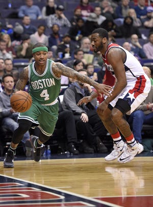 Boston Celtics guard Isaiah Thomas is vying for a reserve spot for the NBA All-Star Game. The Associated Press